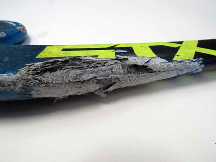 large hole on the side of a field hockey stick.